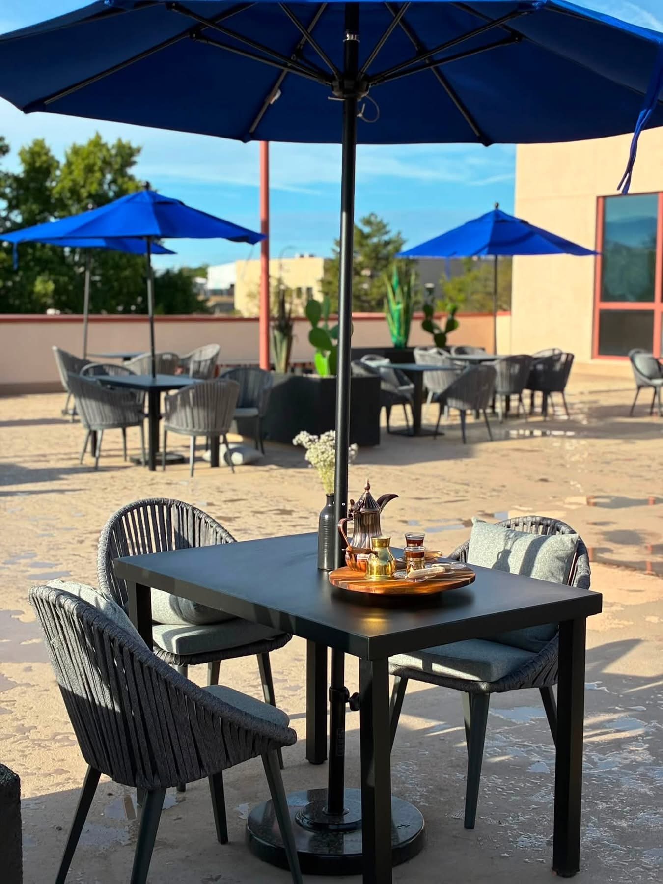 The Lazy Buffalo patio with Turkish coffee service and mountain views